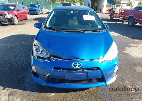 2014 Toyota Prius C Two from USA, damaged, VIN JTDKDTB37E1084311